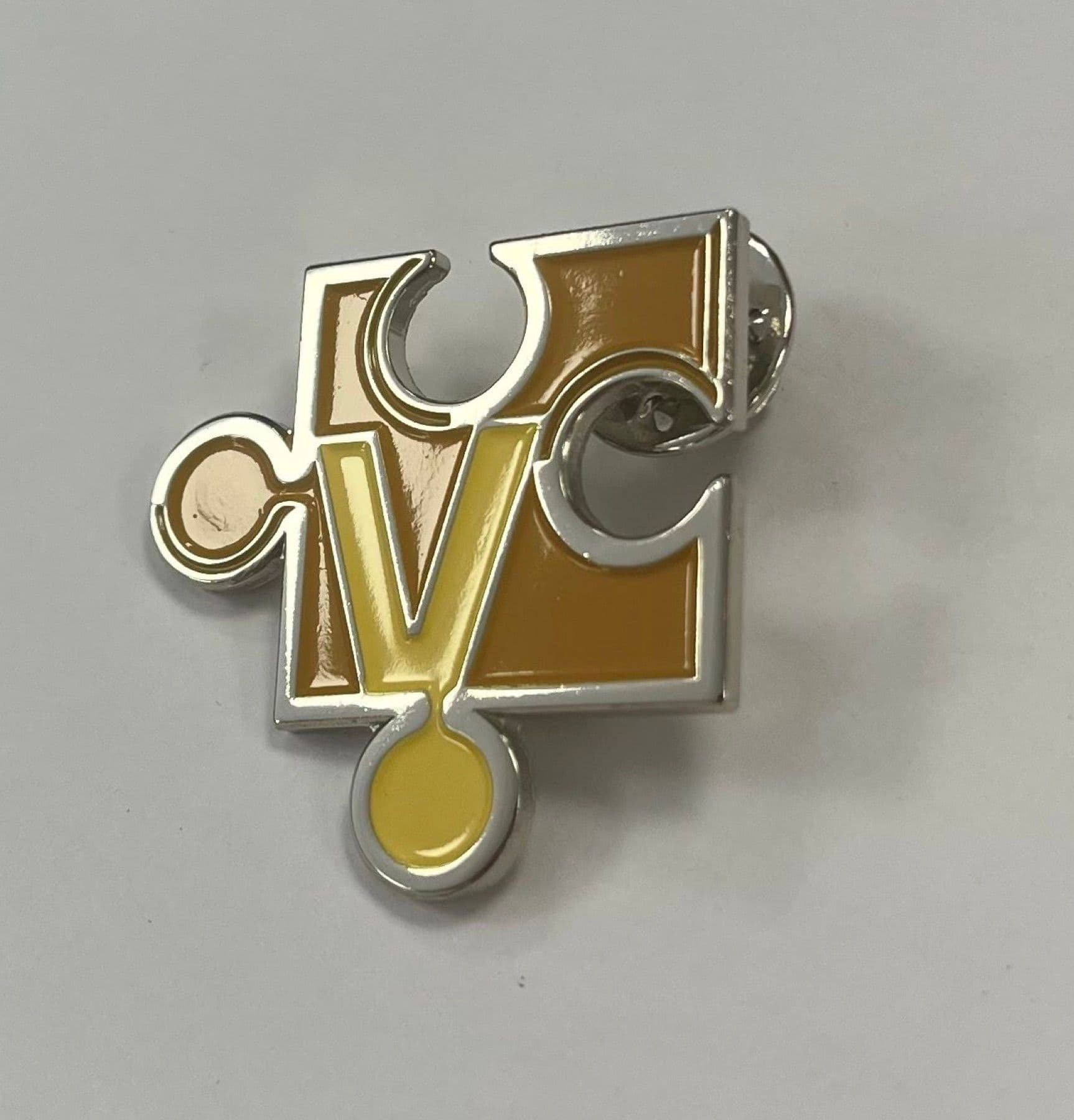 Enamel pin badge in a puzzle piece form